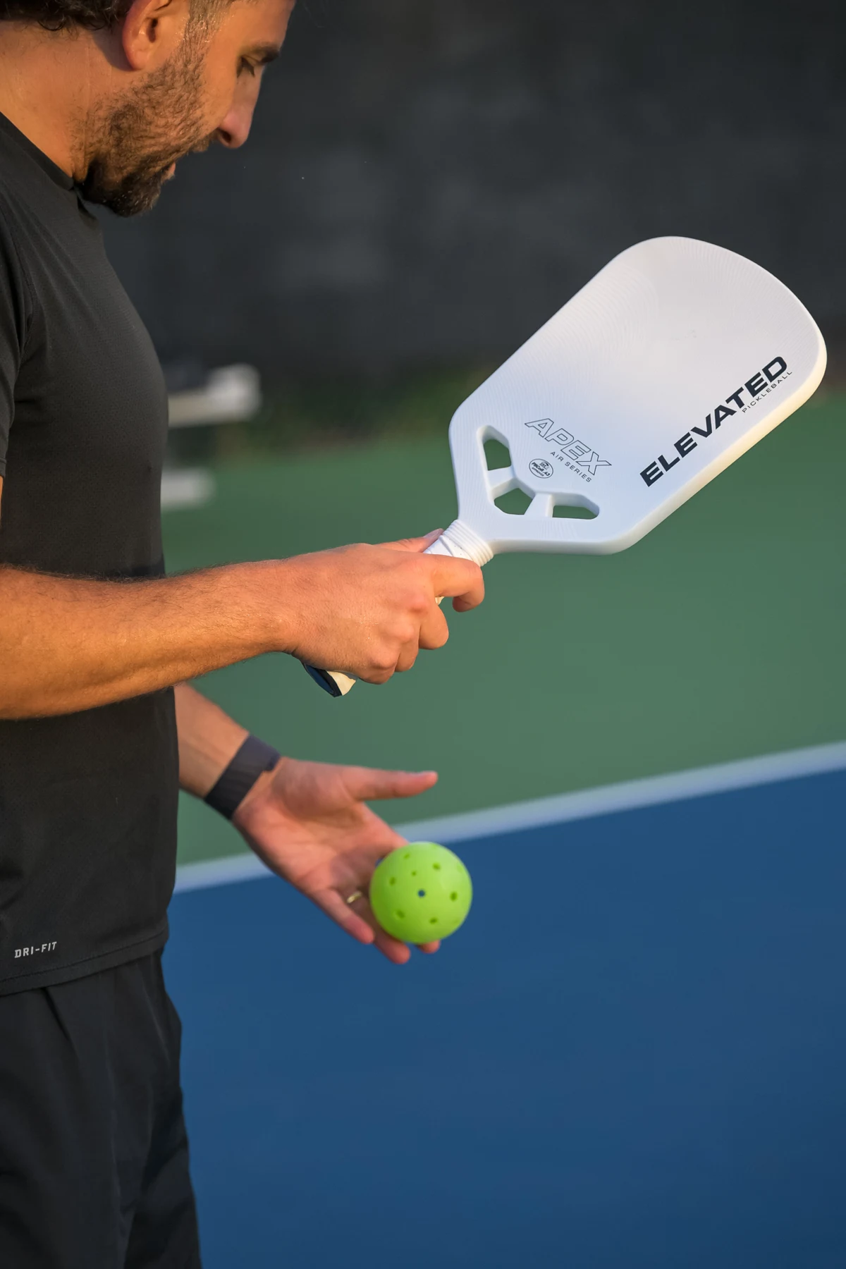 White paddle in hand